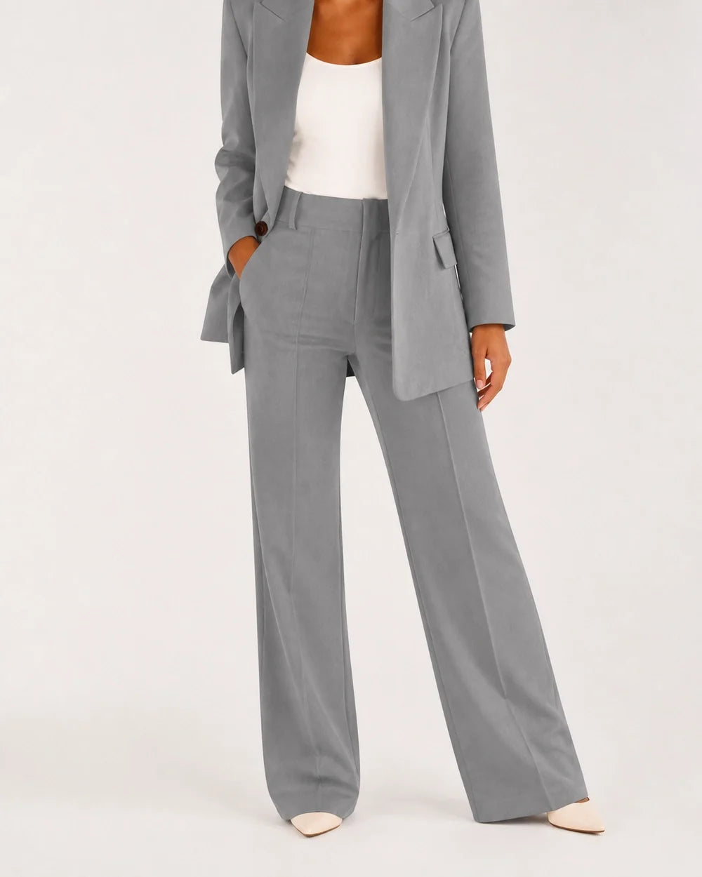 Grey relaxed blazer and wide-leg trousers set for women, worn view