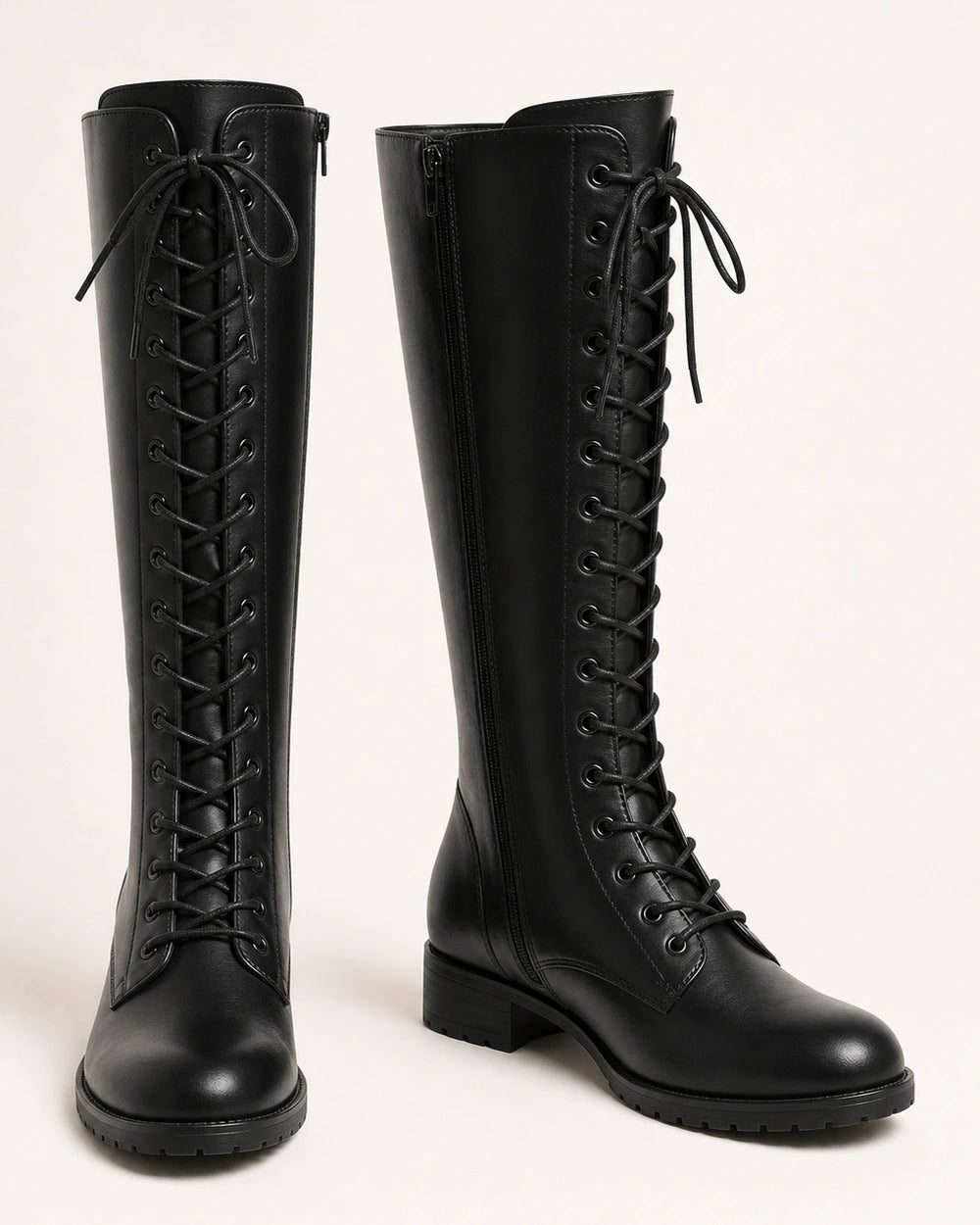 Women's black lace-up knee-high boots, product-only pair.