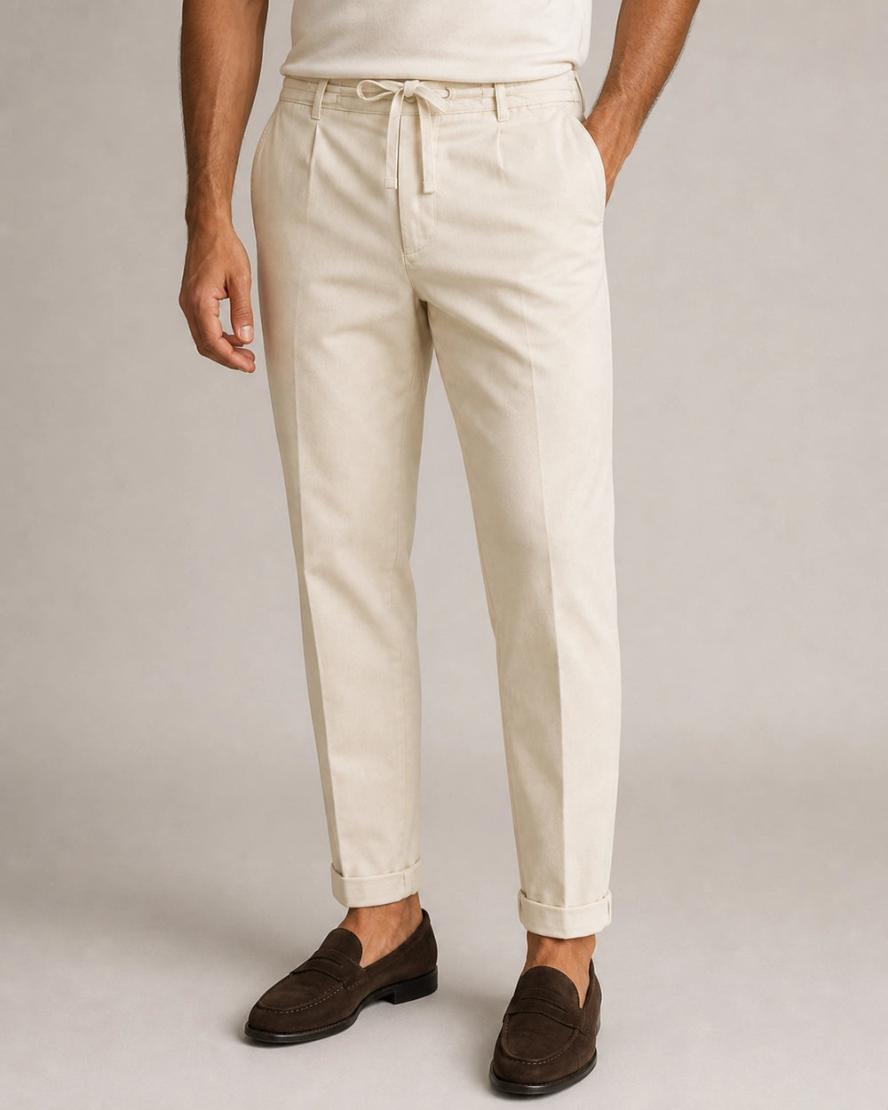 Men's beige relaxed elastic-waist summer pants, product-first front view.