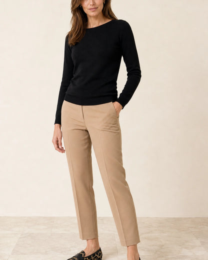 Women's Animal-Print Loafers with Black Trim — worn by a model