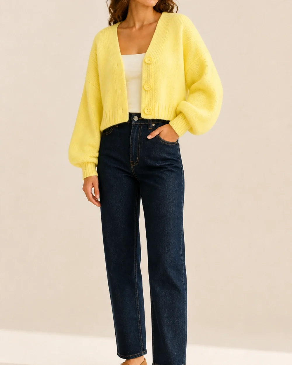 Women's yellow cropped balloon-sleeve cardigan with dark denim styling