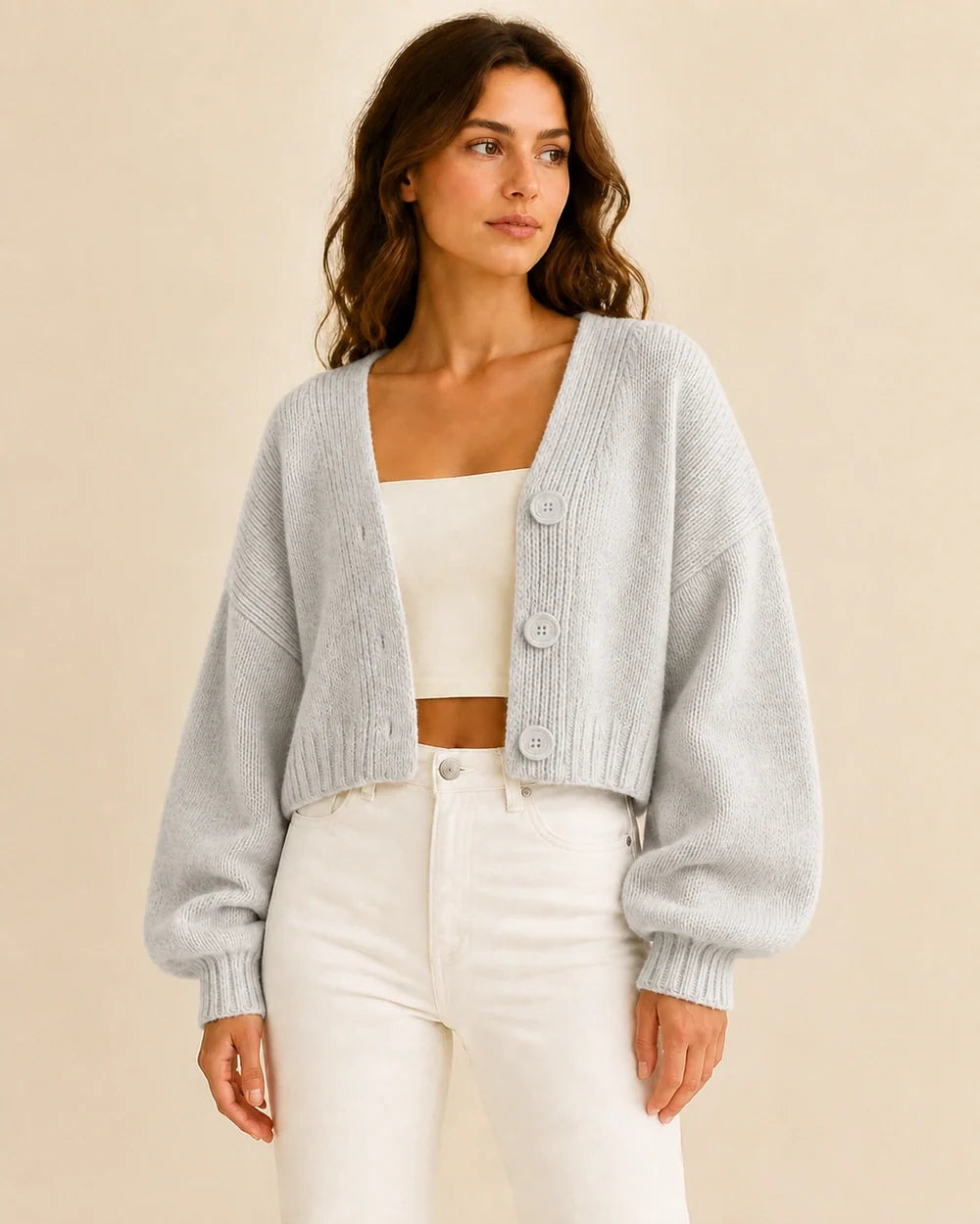 Women's light grey cropped balloon-sleeve cardigan, worn front view