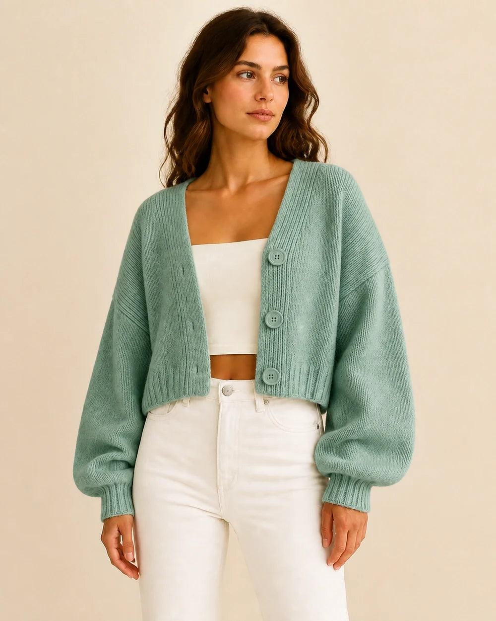 Women's green cropped balloon-sleeve cardigan, worn front view