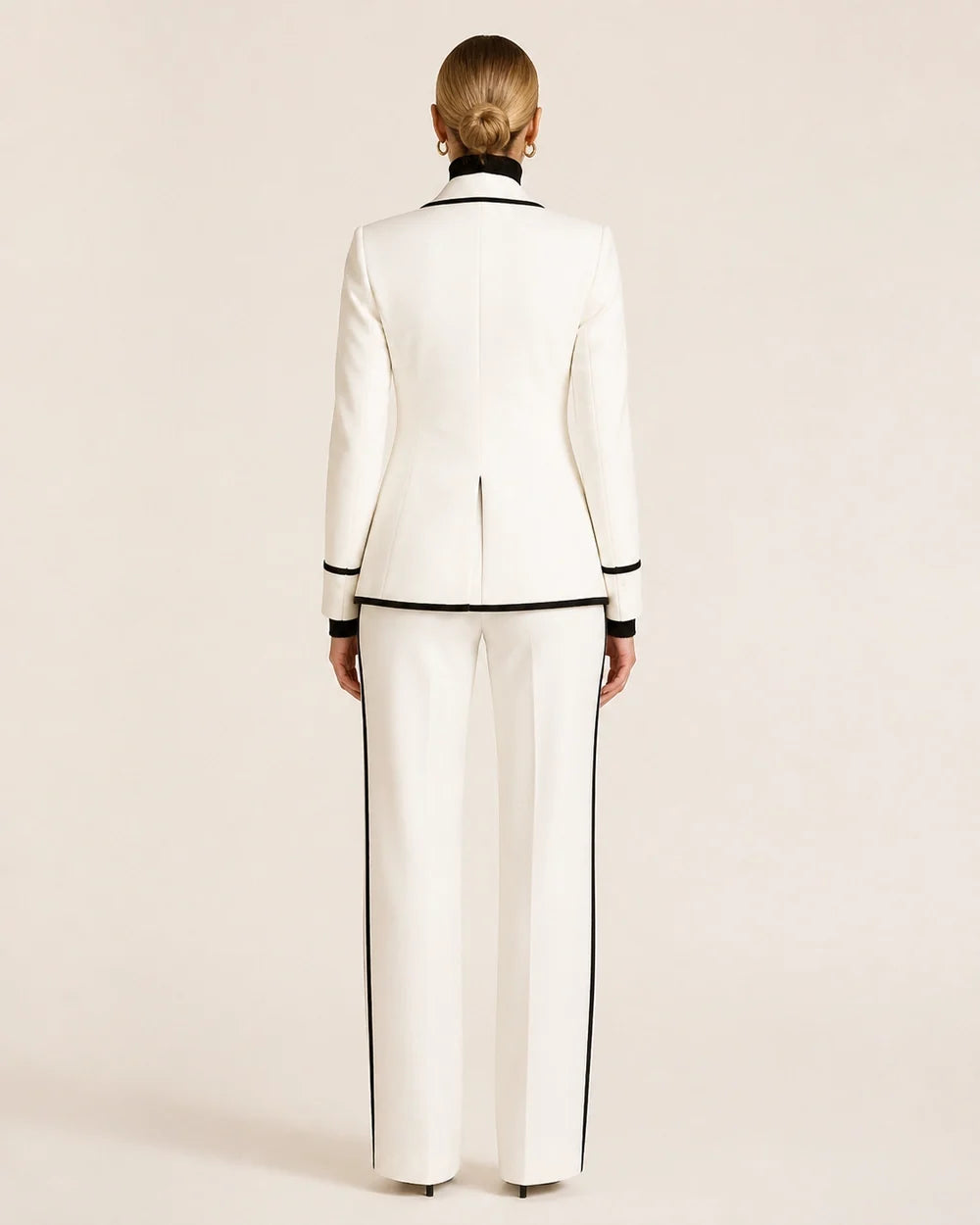White color-block double-breasted blazer and trouser suit for women, back view