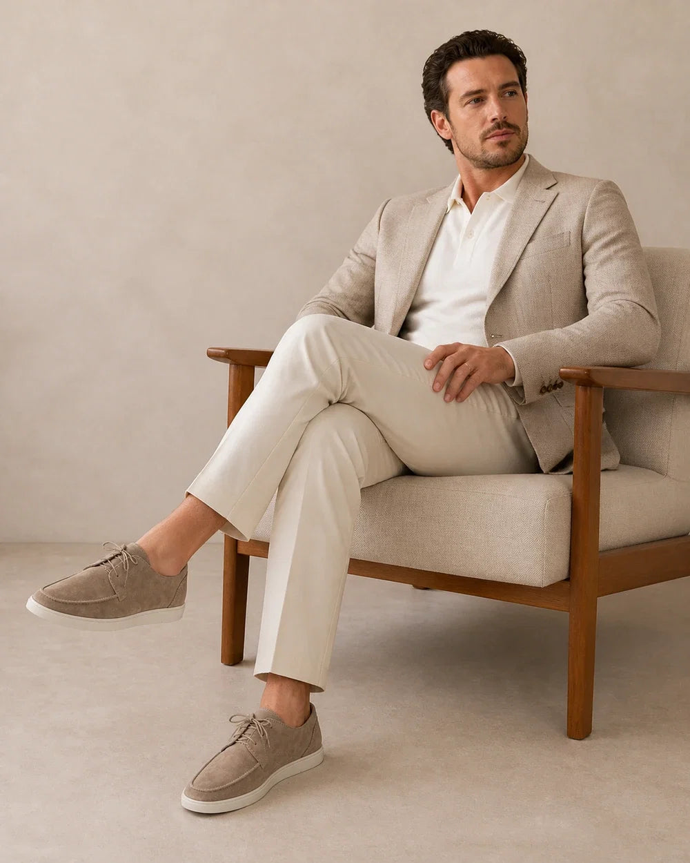 Seated styling view with beige lace-up moccasins.