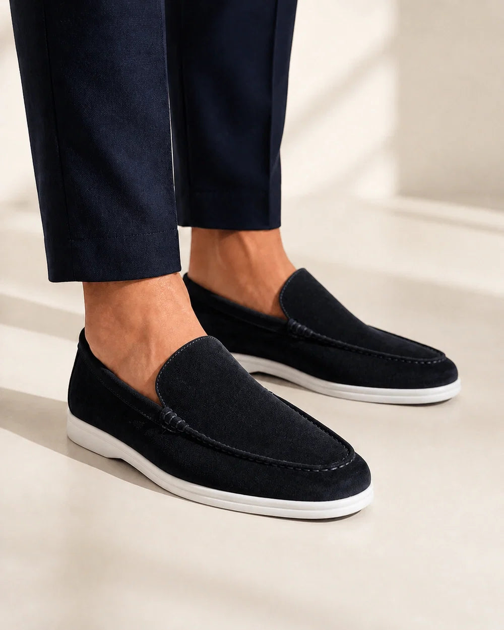 Men wearing black suede-effect slip-on loafers, close product-first view.