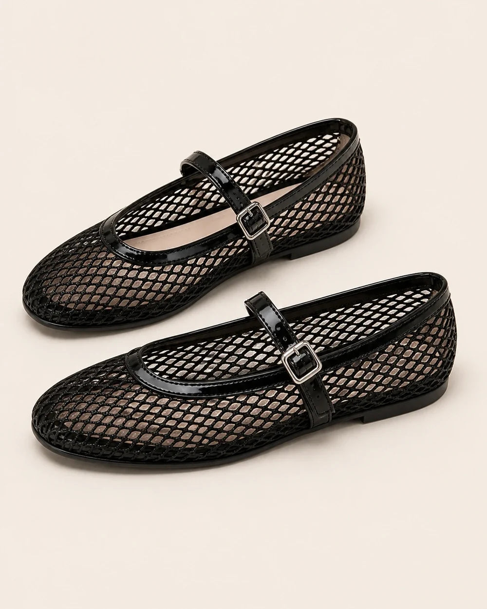 Women’s black mesh Mary Jane ballet flats, product-only pair view.