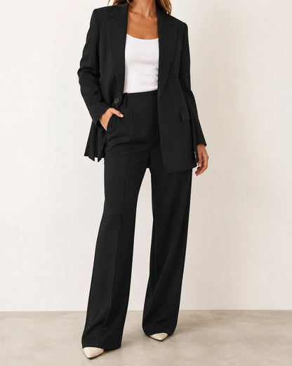 Black relaxed blazer and wide-leg trousers set for women, worn hero view