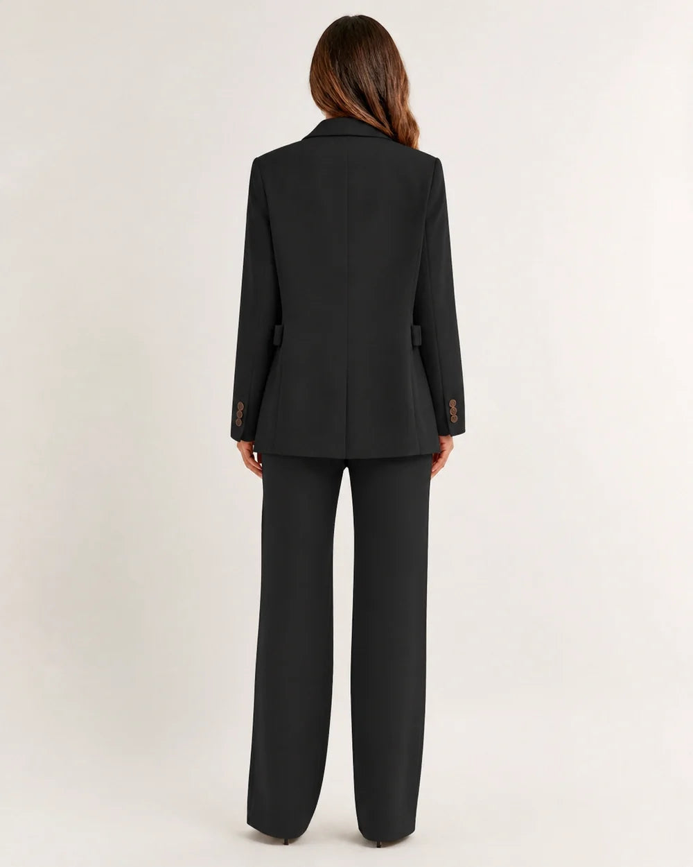 Black relaxed blazer and wide-leg trousers set for women, back view