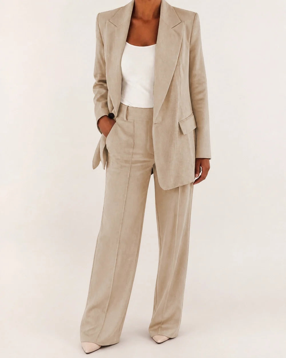 Beige relaxed blazer and wide-leg trousers set for women, worn view