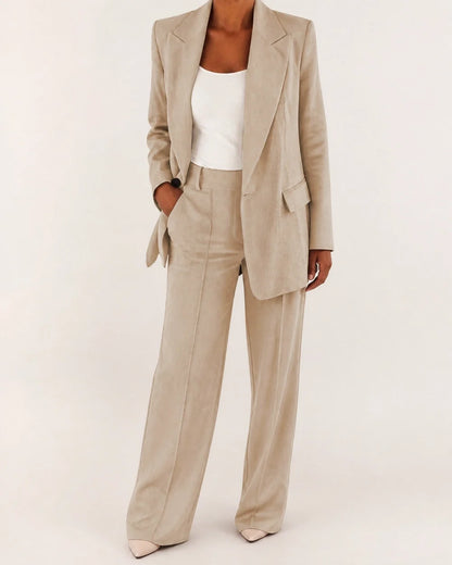 Beige relaxed blazer and wide-leg trousers set for women, worn view