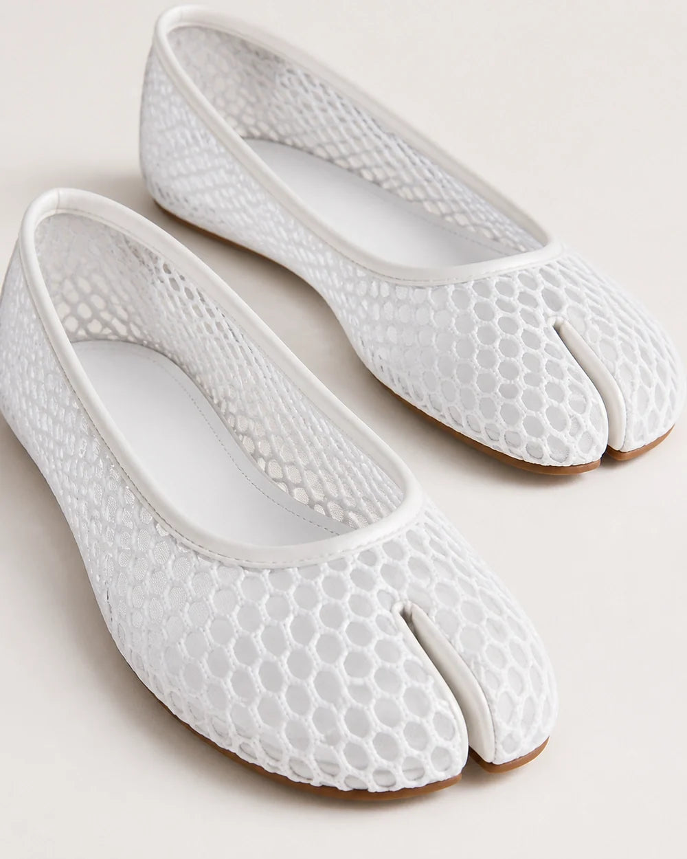 Women's white mesh tabi ballet flats, split-toe mesh detail.