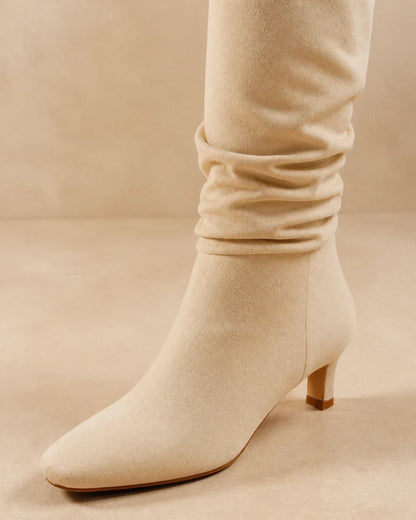 Beige slouchy knee-high boots, detail view