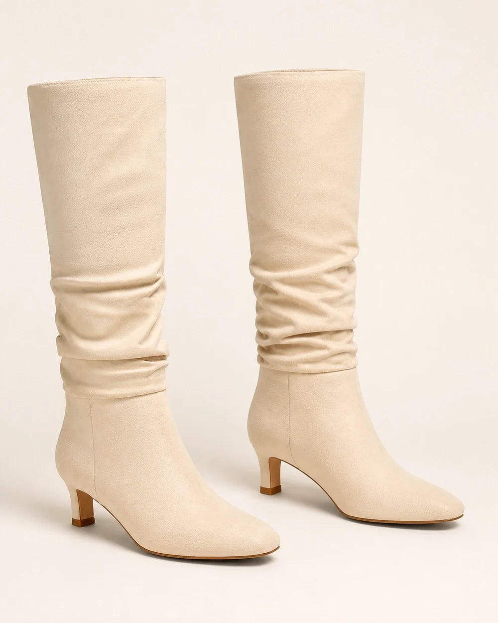 Beige slouchy knee-high boots, product-only view