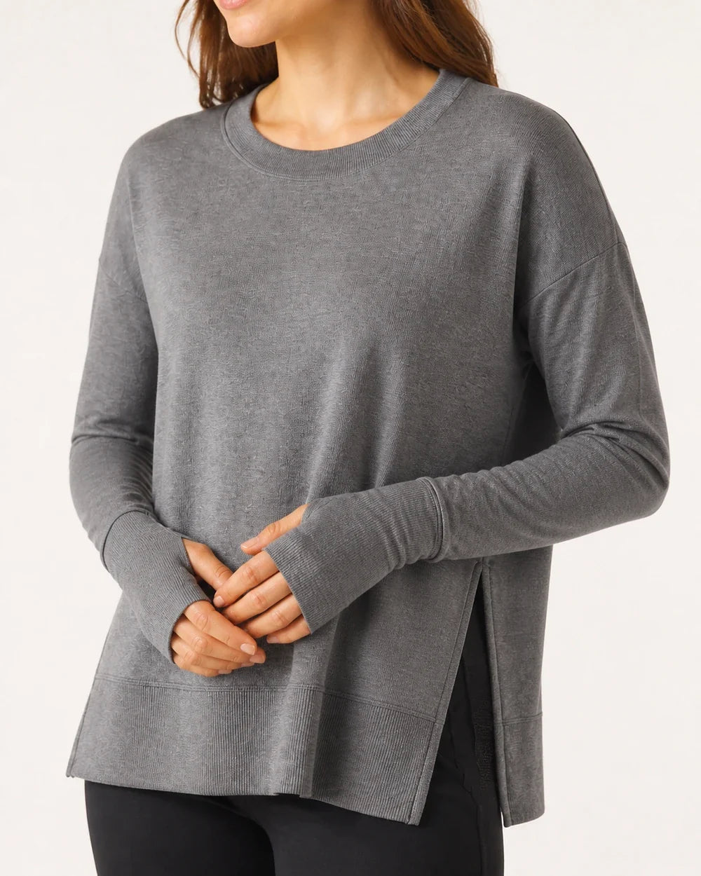 Women's charcoal dolman thumbhole pullover, cuff slit and hem detail