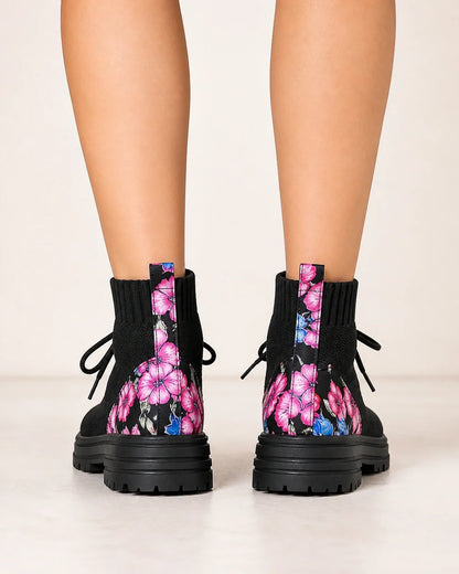 Black knit sock ankle boots rear floral heel view