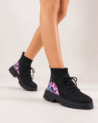 Black knit sock ankle boots walking view