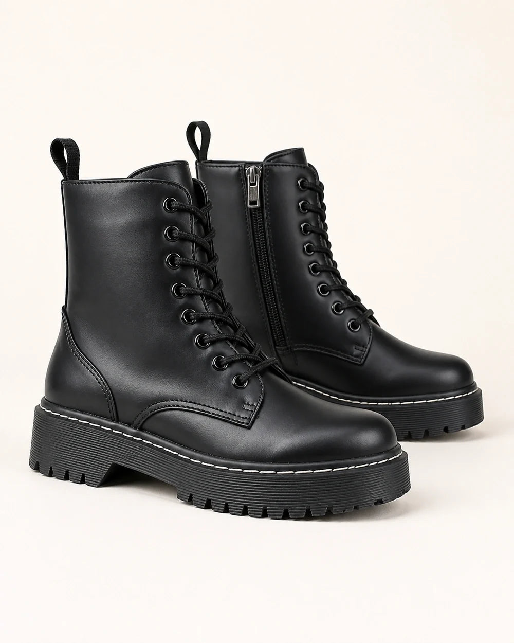 Black lace-up winter ankle boots for women, side profile
