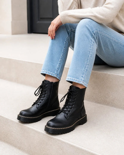 Black lace-up winter ankle boots for women, lifestyle view