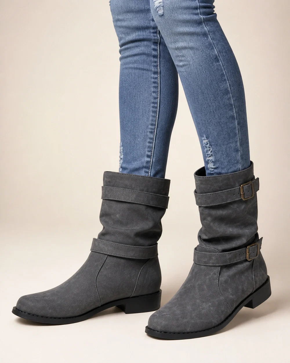 Grey low-heel buckle slouch boots for women, front worn view