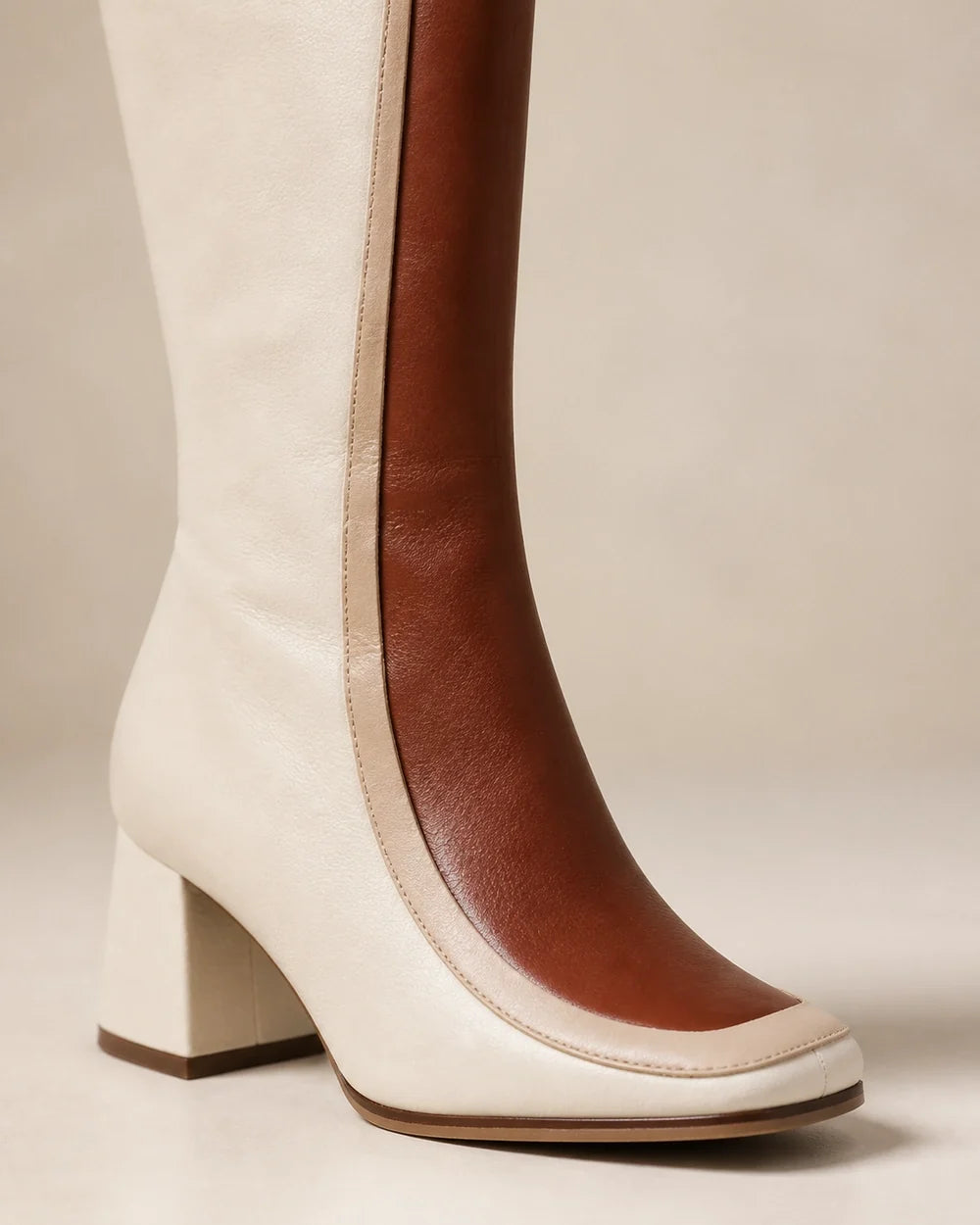 Ivory and tan colour-block knee-high boots, detail view