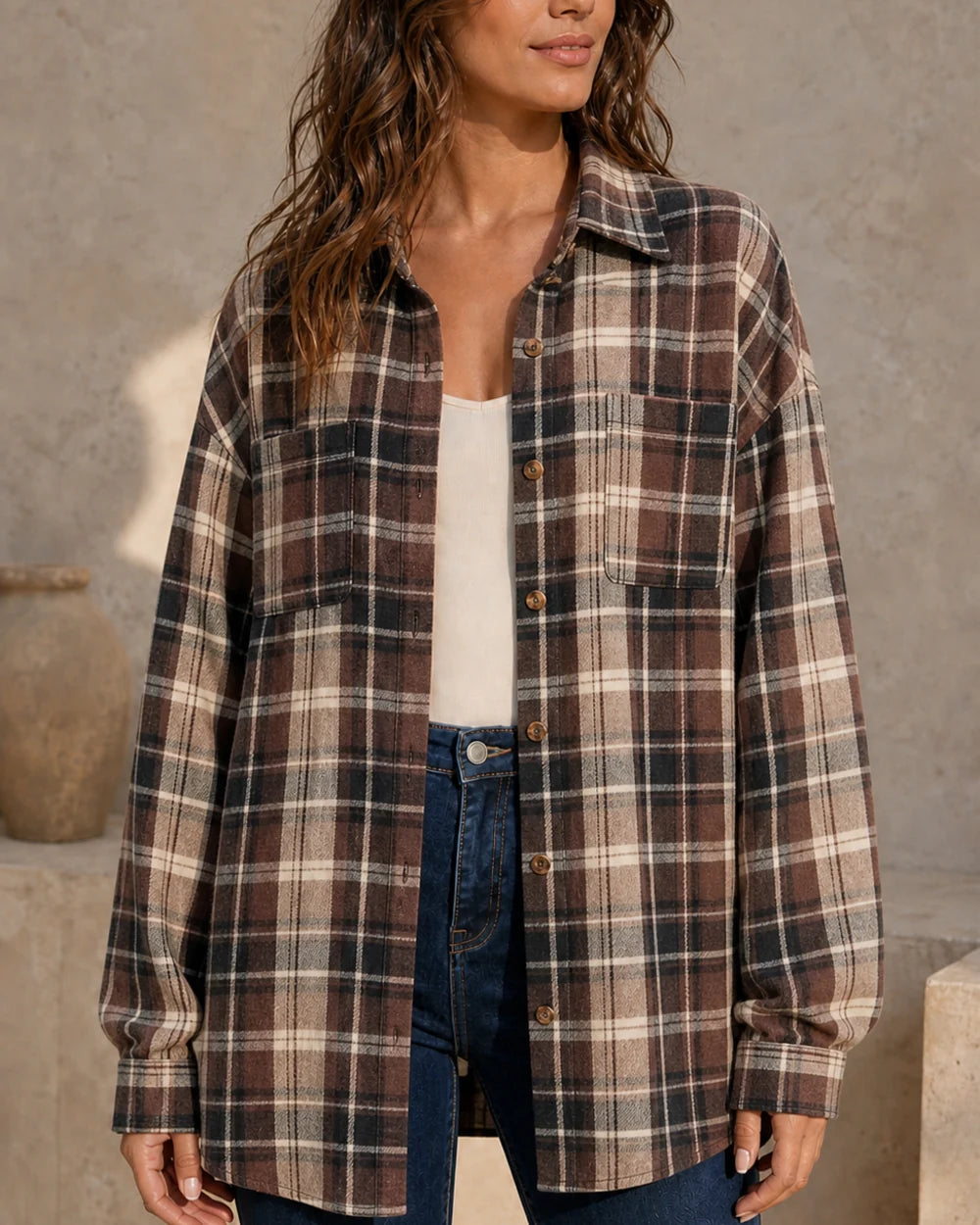 Women's brown, cream and charcoal oversized plaid shirt, front three-quarter worn view. — momount-womens-oversized-plaid-shirt-brown-12-hero.webp