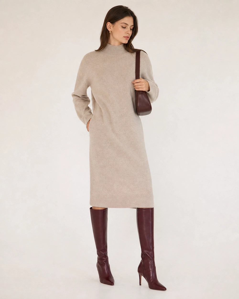 Women's wine-red pointed-toe stiletto knee-high boots, hero view.
