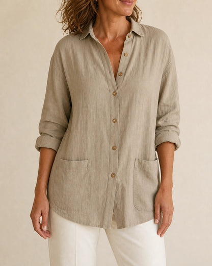 Women's brown relaxed longline shirt, front product view.