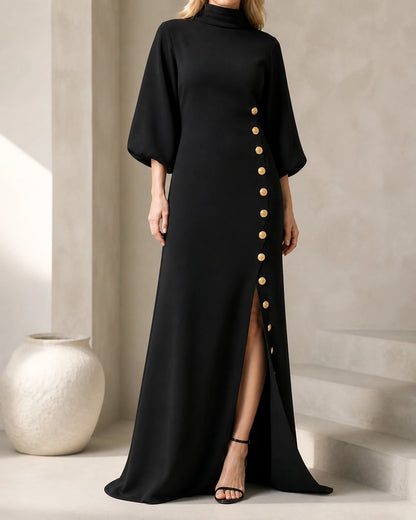 Women’s black maxi dress with gold buttons, front three-quarter view