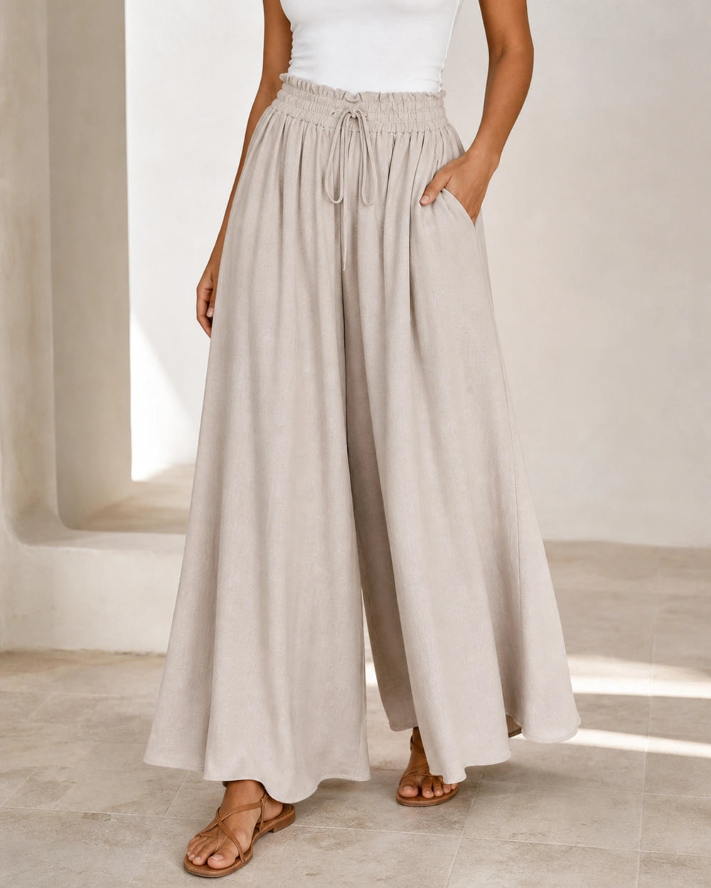Women's high-waist wide-leg trousers in Apricot, hero view. — womens-wide-leg-trousers-apricot-01-hero.webp