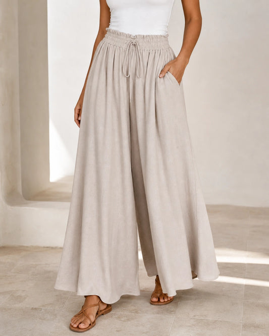 Women's high-waist wide-leg trousers in Apricot, hero view. — womens-wide-leg-trousers-apricot-01-hero.webp