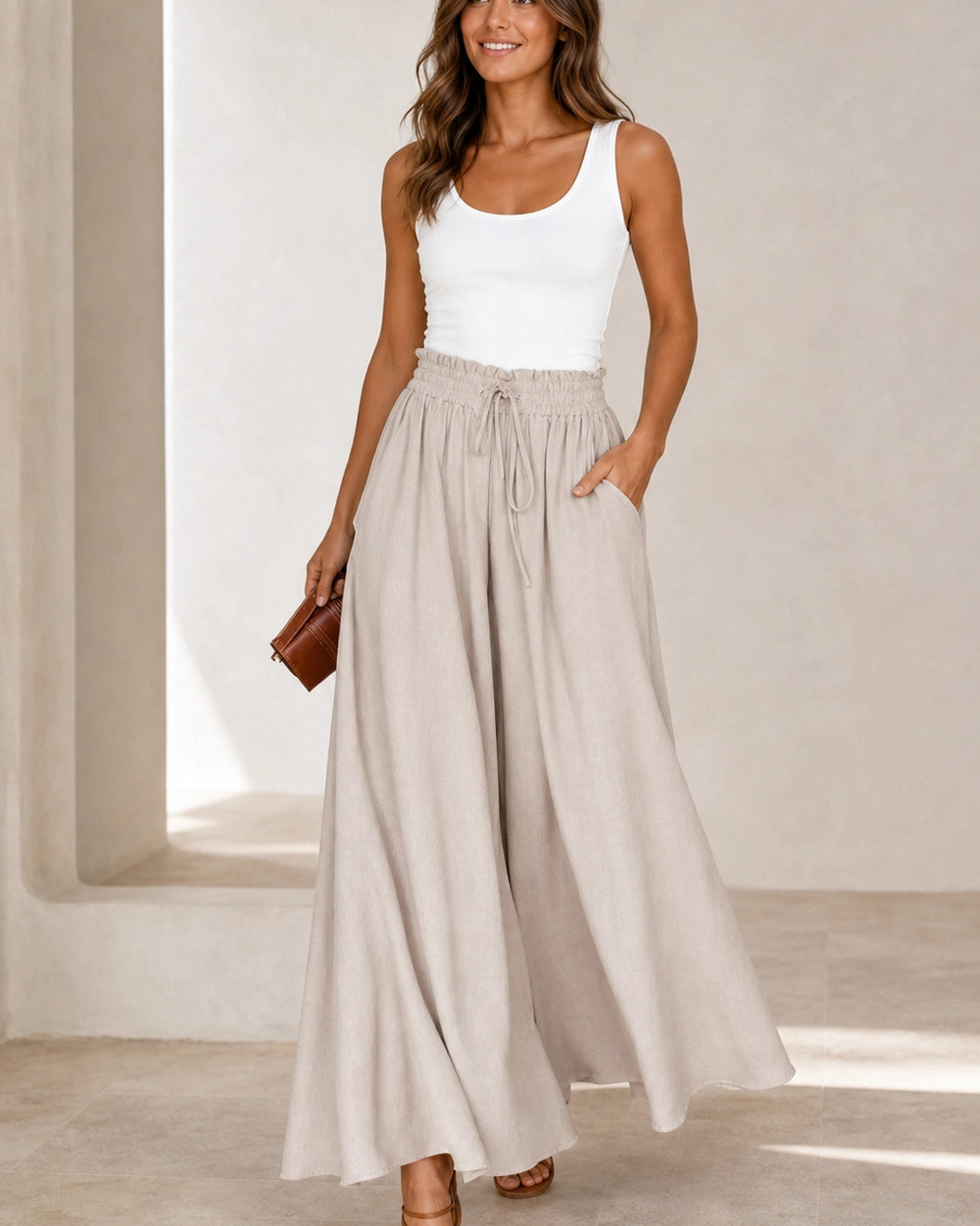 Women's high-waist wide-leg trousers in Apricot, silhouette view. — womens-wide-leg-trousers-apricot-02-silhouette.webp