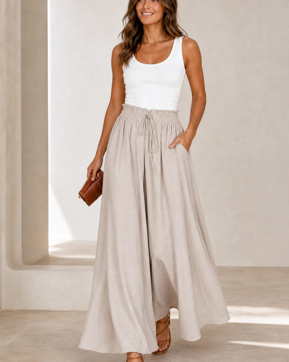 Women's high-waist wide-leg trousers in Apricot, movement view. — womens-wide-leg-trousers-apricot-06-movement.webp